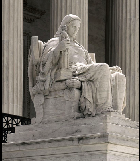 Marble statue by James Earle Fraser, entitled Contemplation of Justice, located on the main steps of the Supreme Court Building.