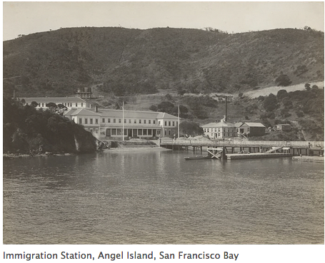 Black-and-white photograph of the Angel Island immigration station in San Francisco Bay.