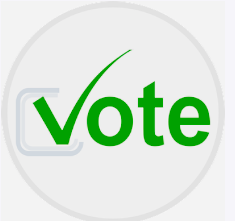 Graphic of a gray circle outline on a white background, with the word "Vote" written in green and the letter "V" forming the checkmark on a ballot entry.