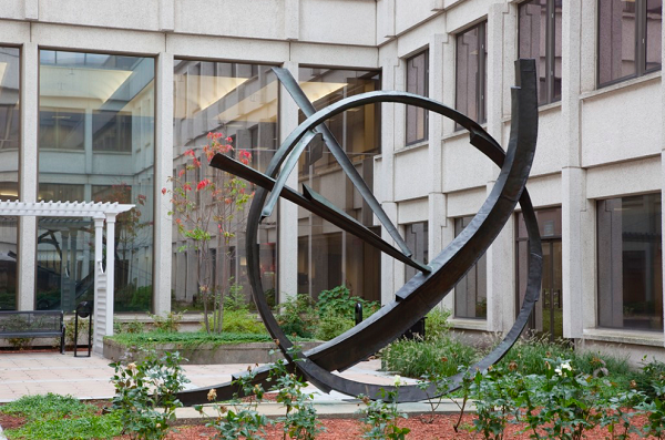 Copper sculpture entitled "Full Circle: Profile of Courage", created by Herbert Ferber in 1968, located in the John F. Kennedy Federal Building in Boston, Massachusetts.