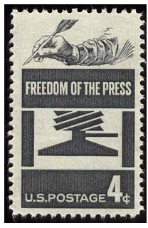 4-cent U.S. postage stamp issued in 1958, containing a drawing of a hand holding a quill pen, a graphic of a printing press, and the words "Freedom of the Press."