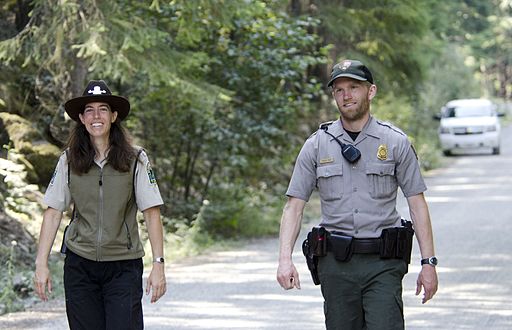 BC Parks Interpretive Ranger AJ and National Park Service Law Enforcement Ranger Mike work together to keep a bear out of the Hozomeen campground along the US-Canada border in Washington state and British Columbia.