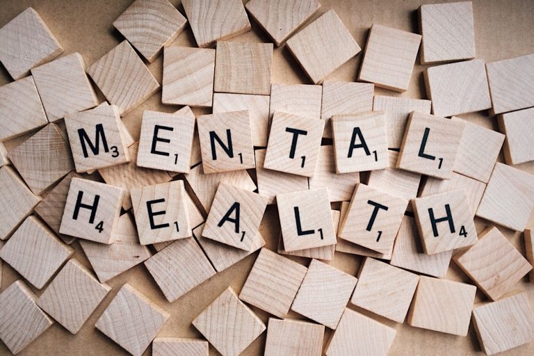 Scrabble tiles spelling out "Mental Health"