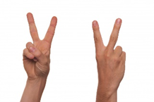 Hand with index and middle fingers extended in an upwards V, other fingers folded
