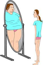 Very thin woman seeing herself in mirror as obese