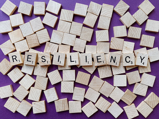 Resiliency spelled out with wooden letters