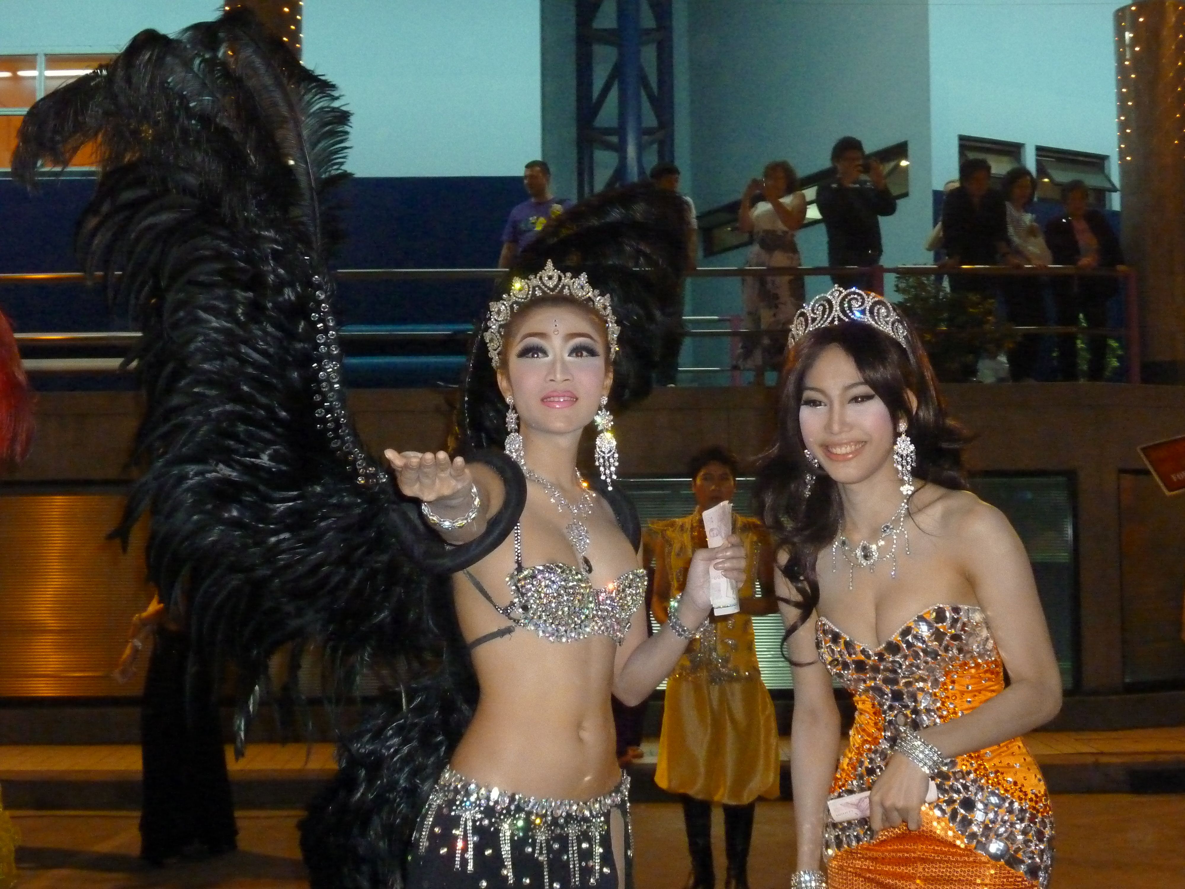 Photo of two kathoey performers shown from the waist up