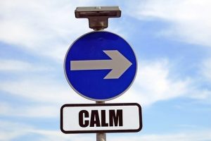 A sign that says calm